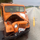 Image for article titled Man Crashes Flimsy Postal Jeep And Somehow Avoids Instant Death